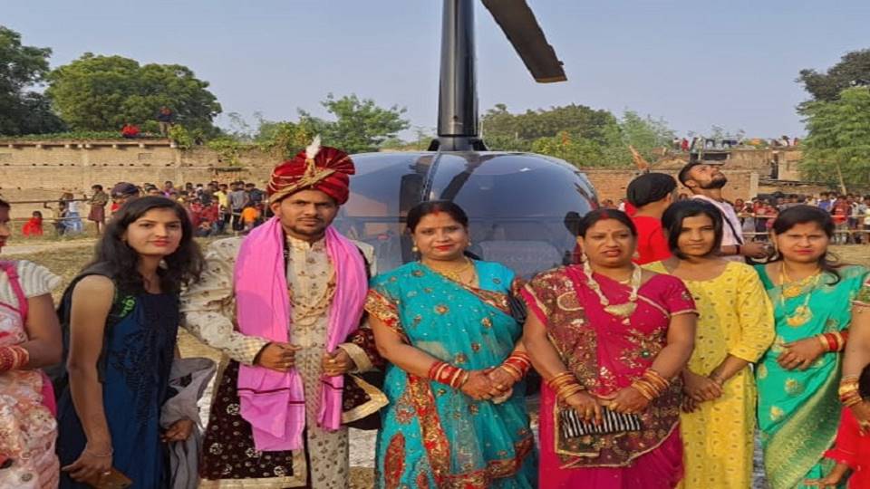 Engineer groom's procession on helicopter