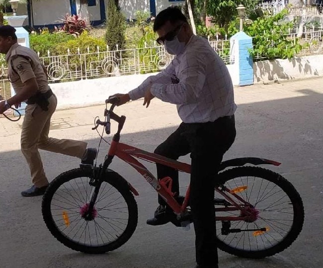 katihar dm on bycycle
