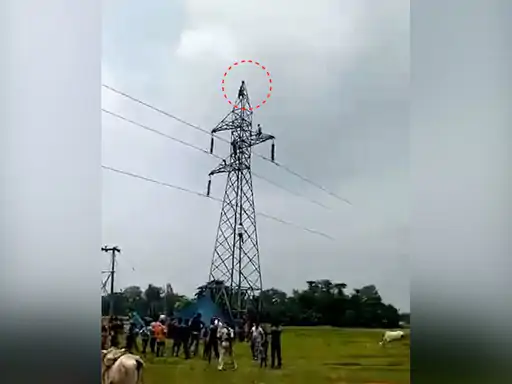 The young man climbed the high tension tower talking about getting married