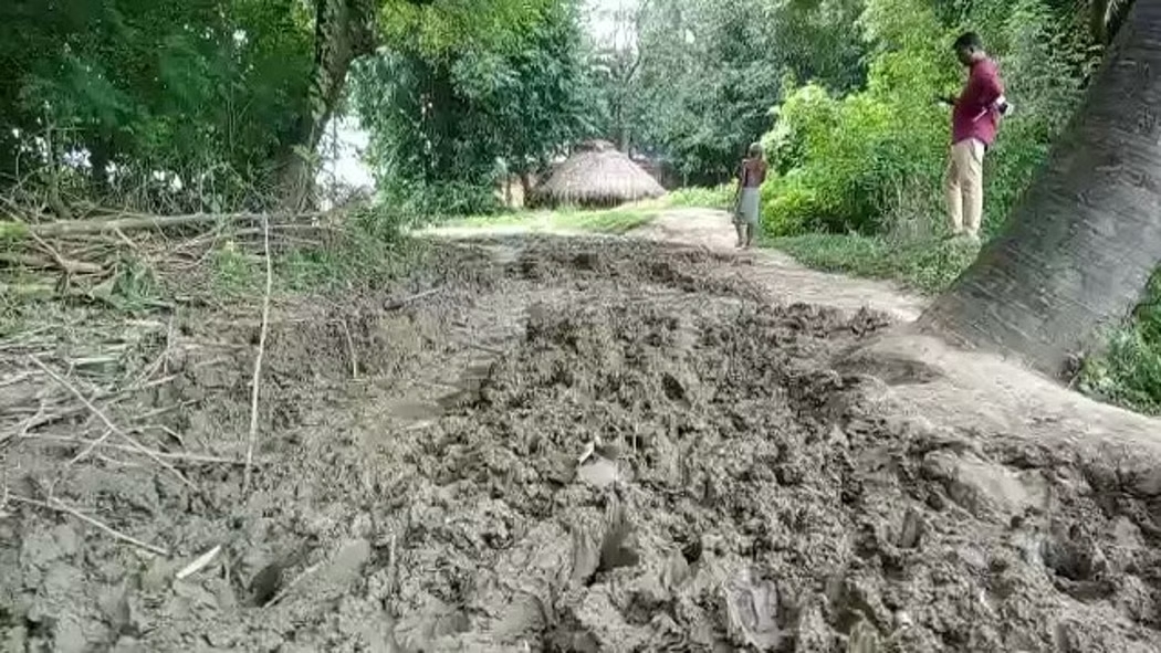 Village road turned into mud
